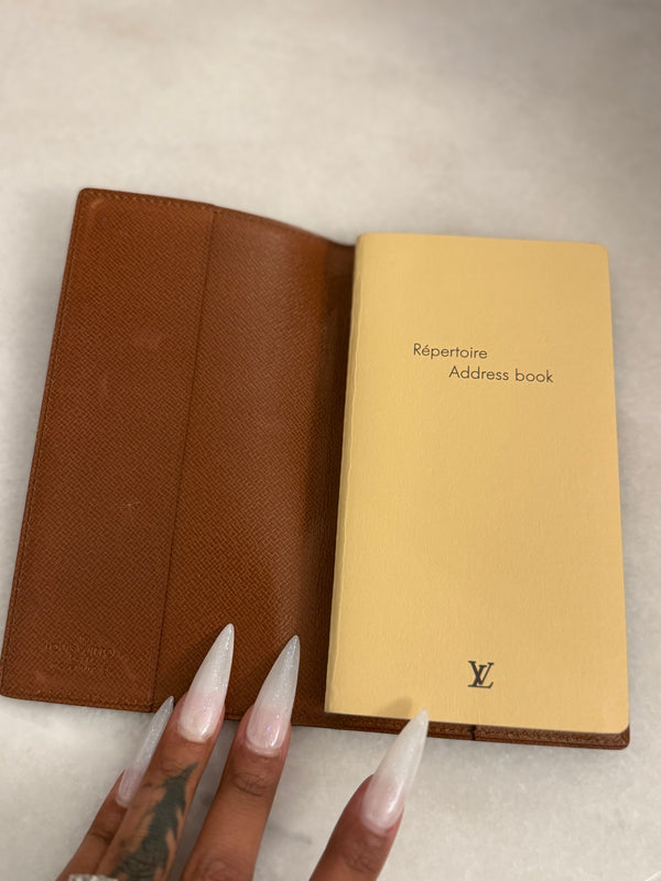 LV preowned address book with paper