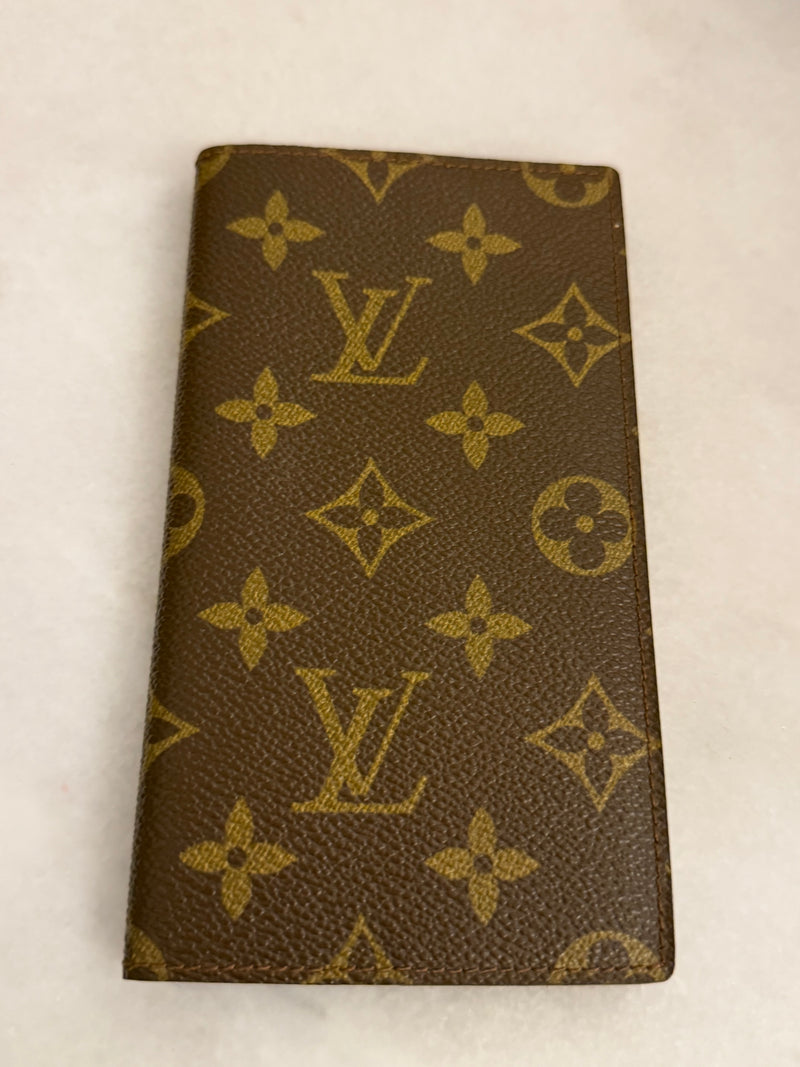 LV preowned address book with paper